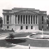 Library & Courts Building and circle, circa 1930. This view of the north facade was taken shortly after the completion of the landscaping (image 6 0f 30)